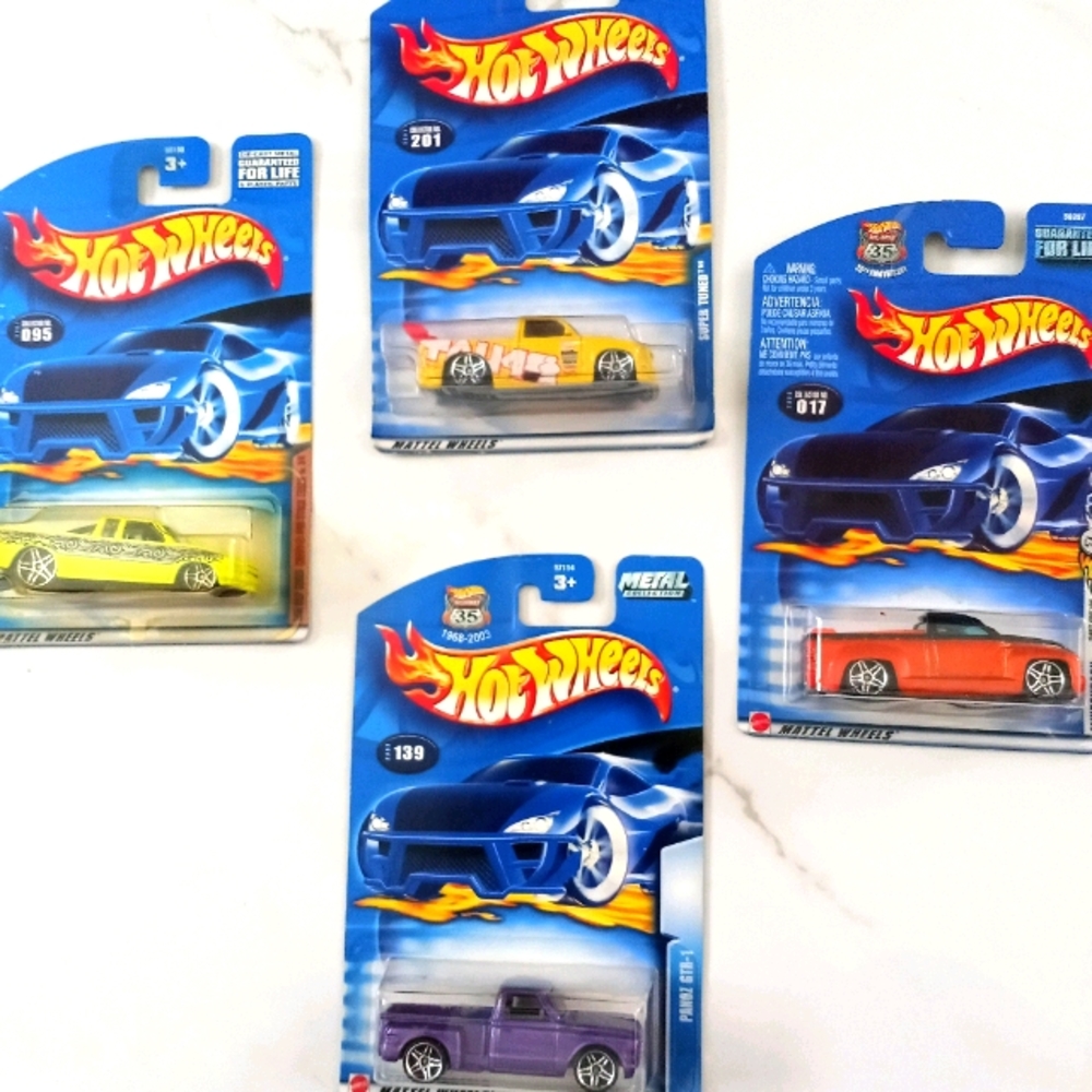 4 HOT WHEELS TRUCKS
